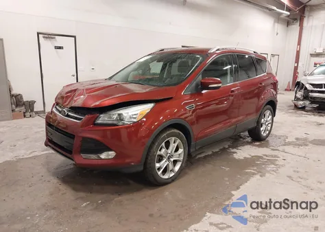 2016 Ford Escape Titanium z USA, uszkodzony, nr VIN 1FMCU9JX0GUC65615
